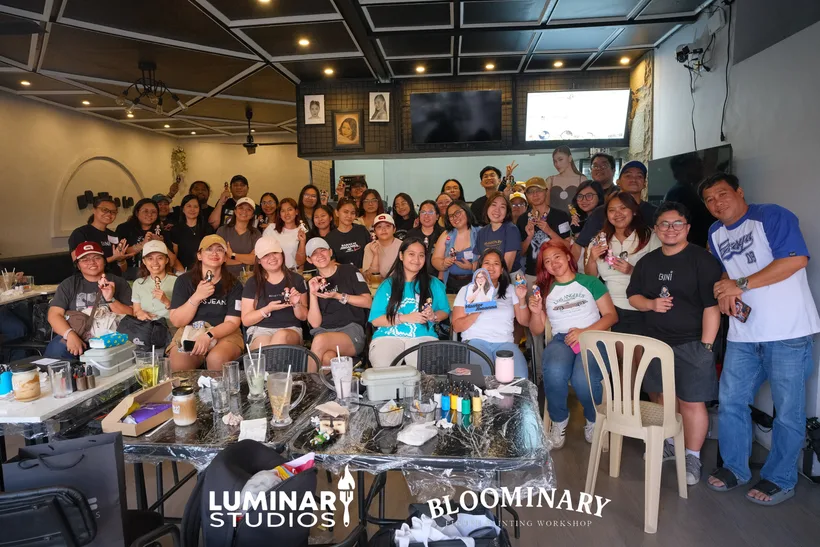 Brewminary workshop group holding custom BINI 3D printed figures in Calamba